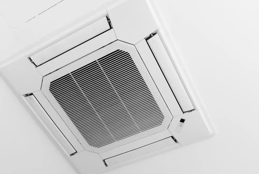 A Close up Of a Ceiling Fan on A White Wall — McGuire Air & Refrigeration In Paget, QLD