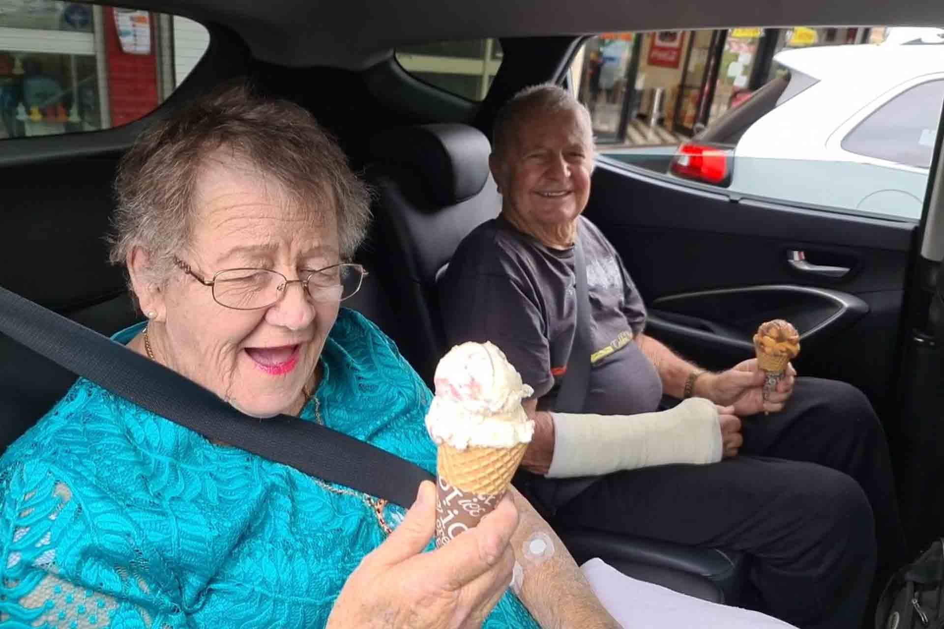 Eldery couple enjoying an ice cream