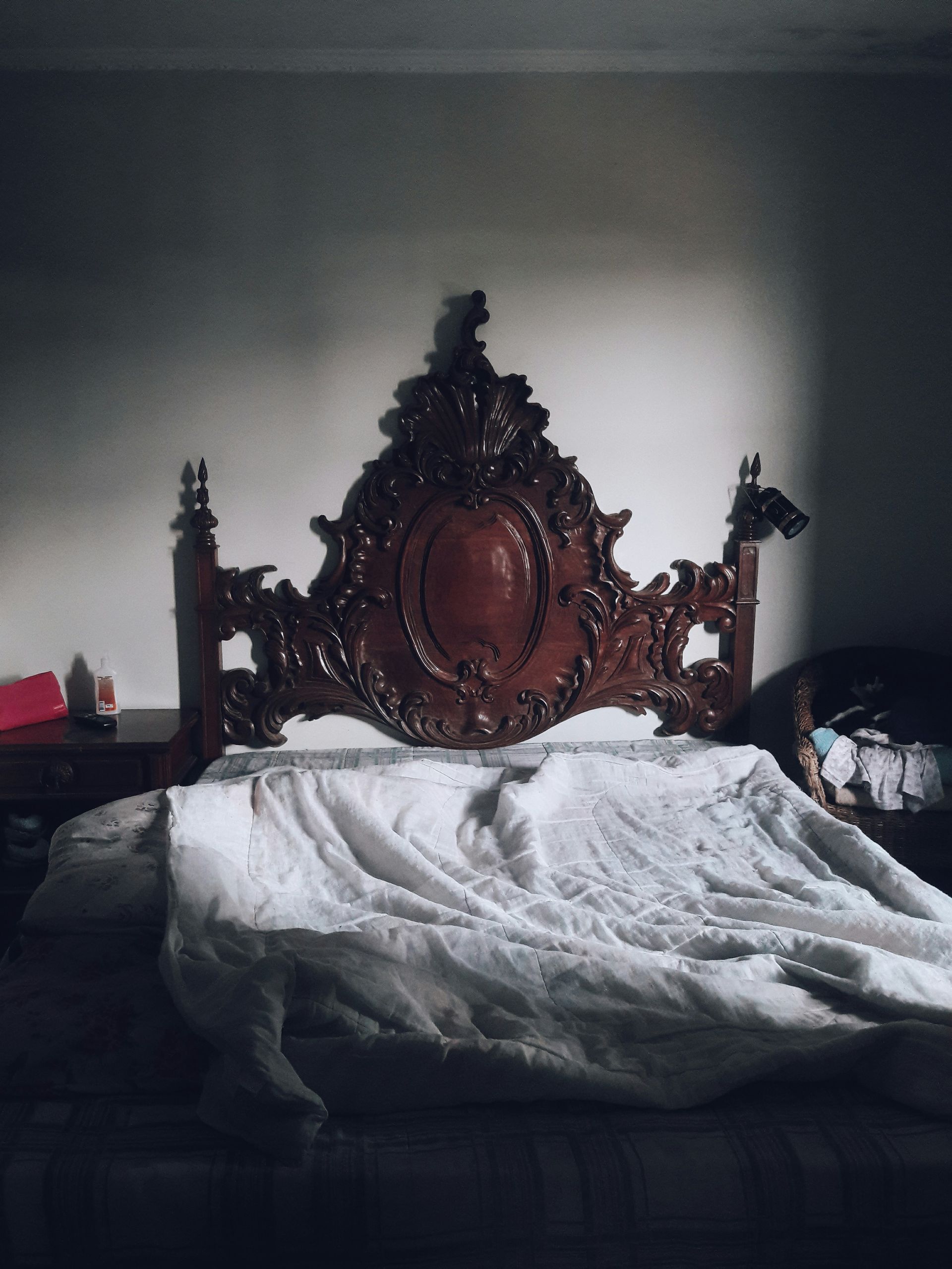An antique bed frame symbolizes talking about what you like in the bedroom. 