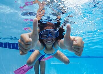 Girl diving - Swimming Pool Cover & Enclosure Dealers in Mechanicsburg, PA
