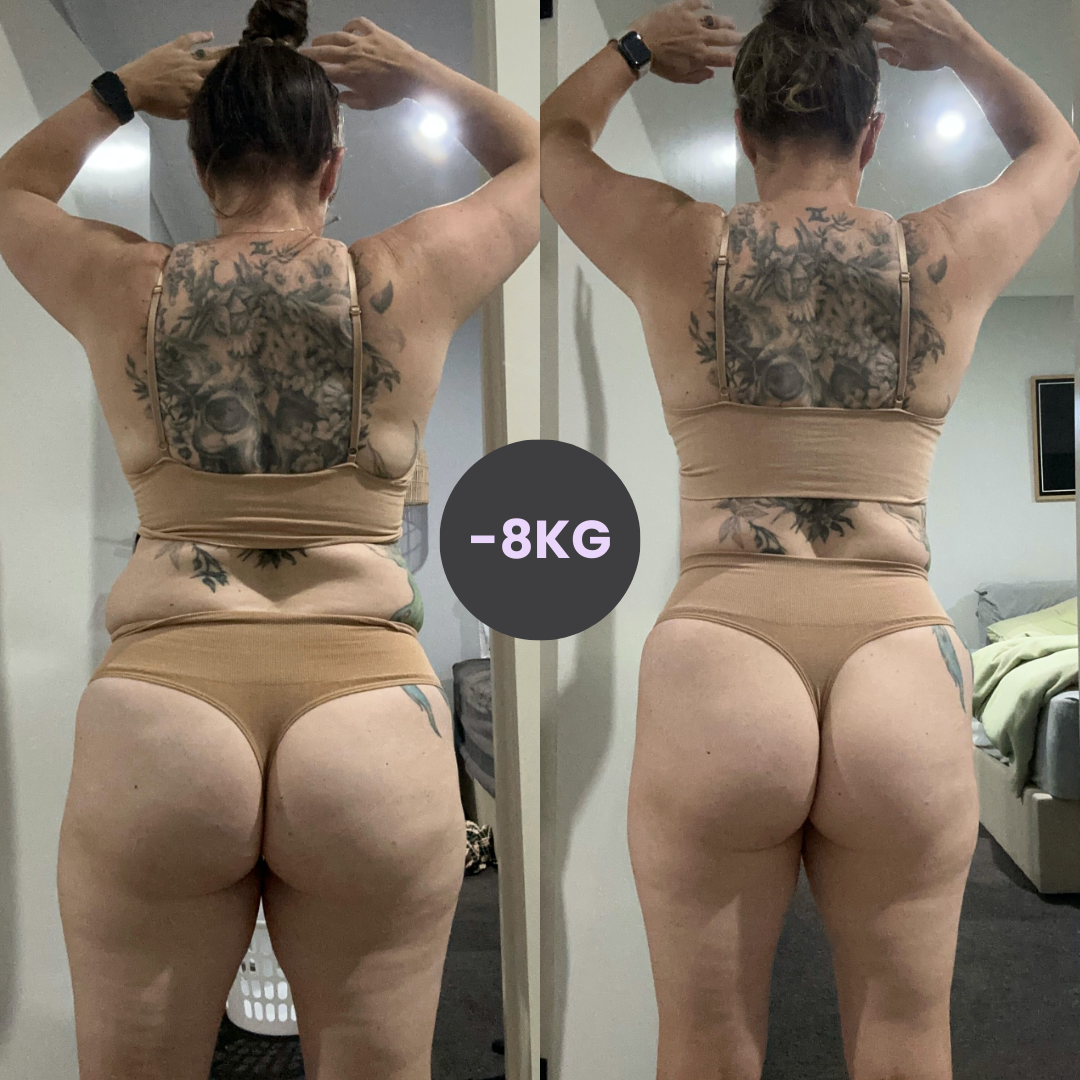 A woman with tattoos on her back is standing in front of a door.