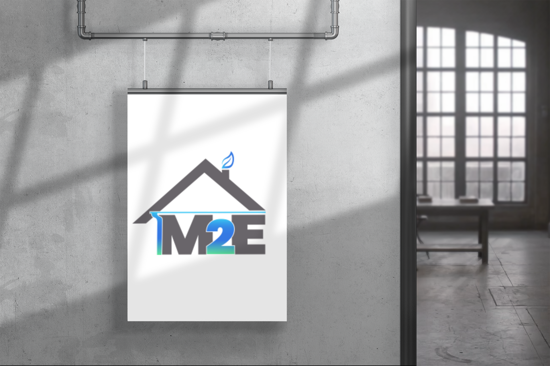 Affiche avec le logo d'une maison, le texte « IM2E » et une goutte d'eau bleue sur un mur gris.