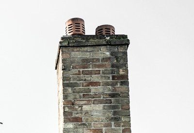 Chimney with Cracked or Crumbling Crowns — Twin Cities, MN — ProTech Chimney Restoration