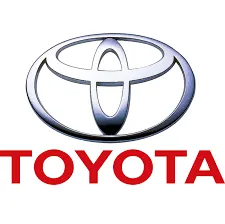 Toyota logo with silver emblem above red “TOYOTA” text on a white background