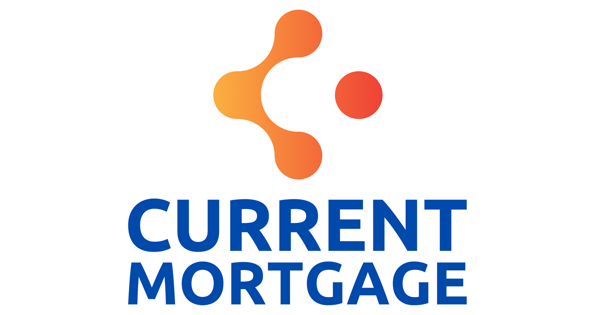 Woman with curly hair and glasses smiles at the camera in an office setting.