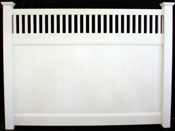 A white fence with black stripes on it