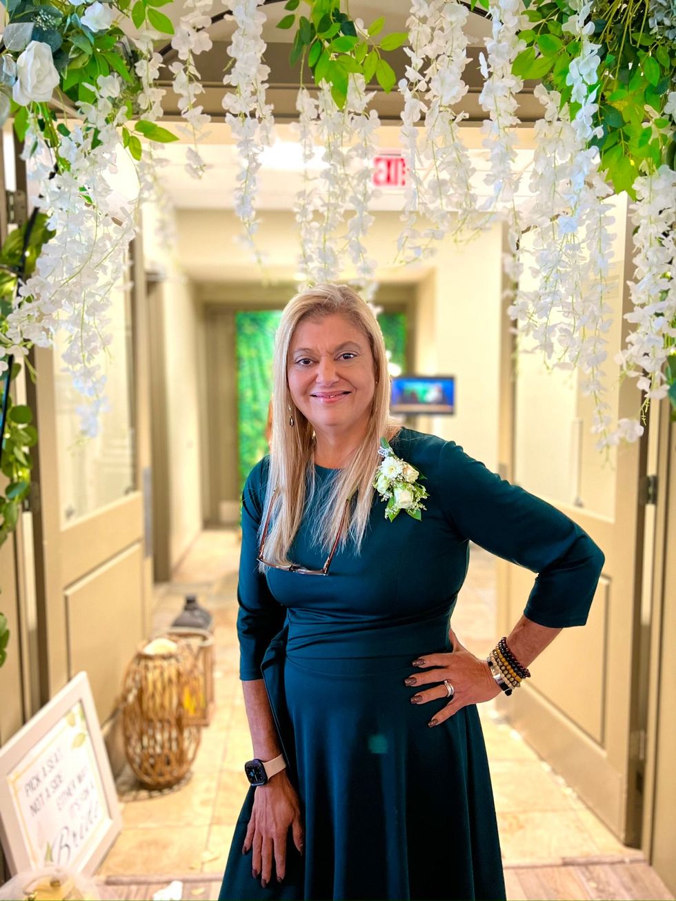 A glass of red wine branded 