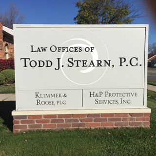 A sign for the law offices of todd j.stearn p.c.