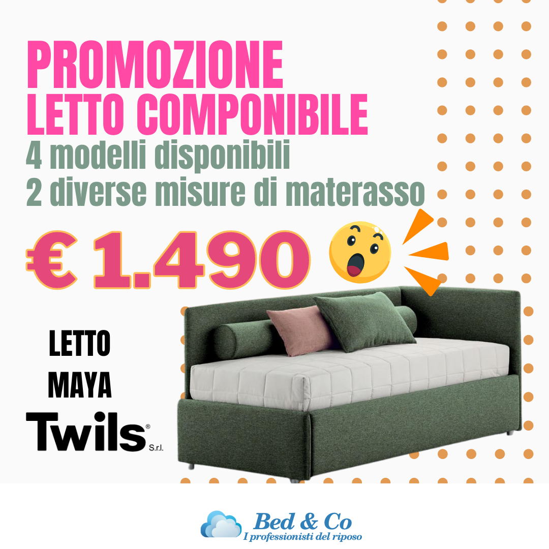 Un letto con un materasso e dei cuscini sopra