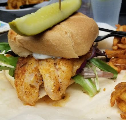 A close up of a drink in a cup on a table.