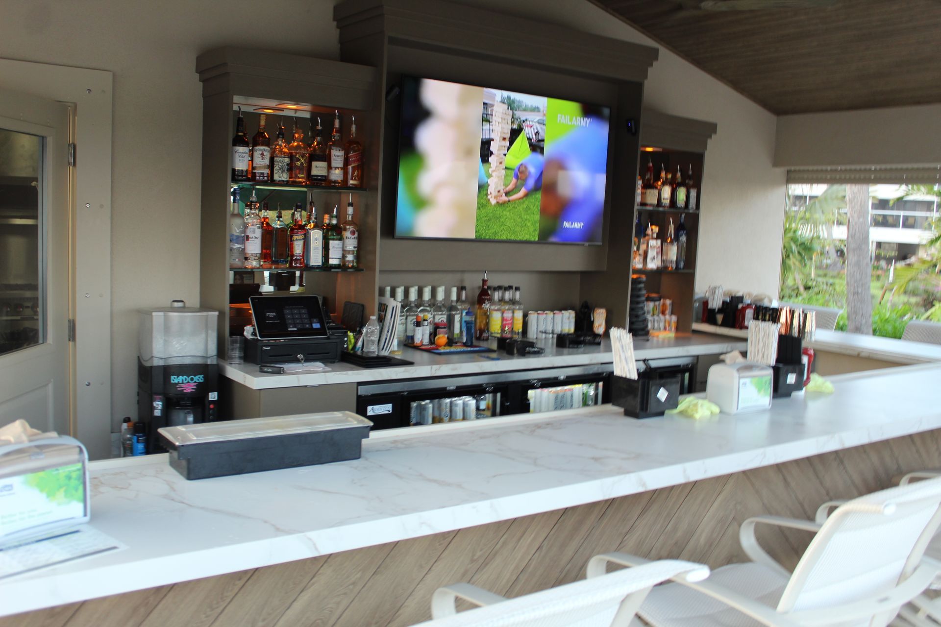 The tv behind the bar