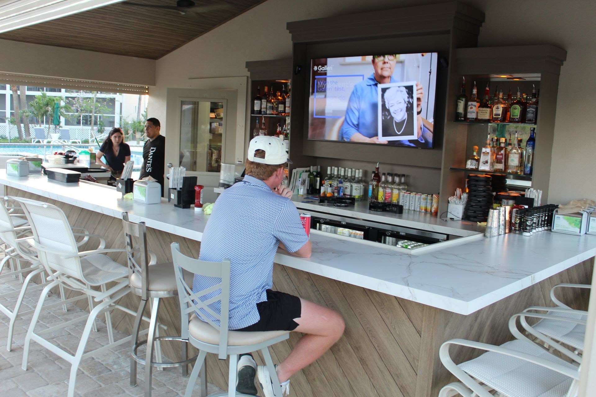 The bar with a guy watching the tv
