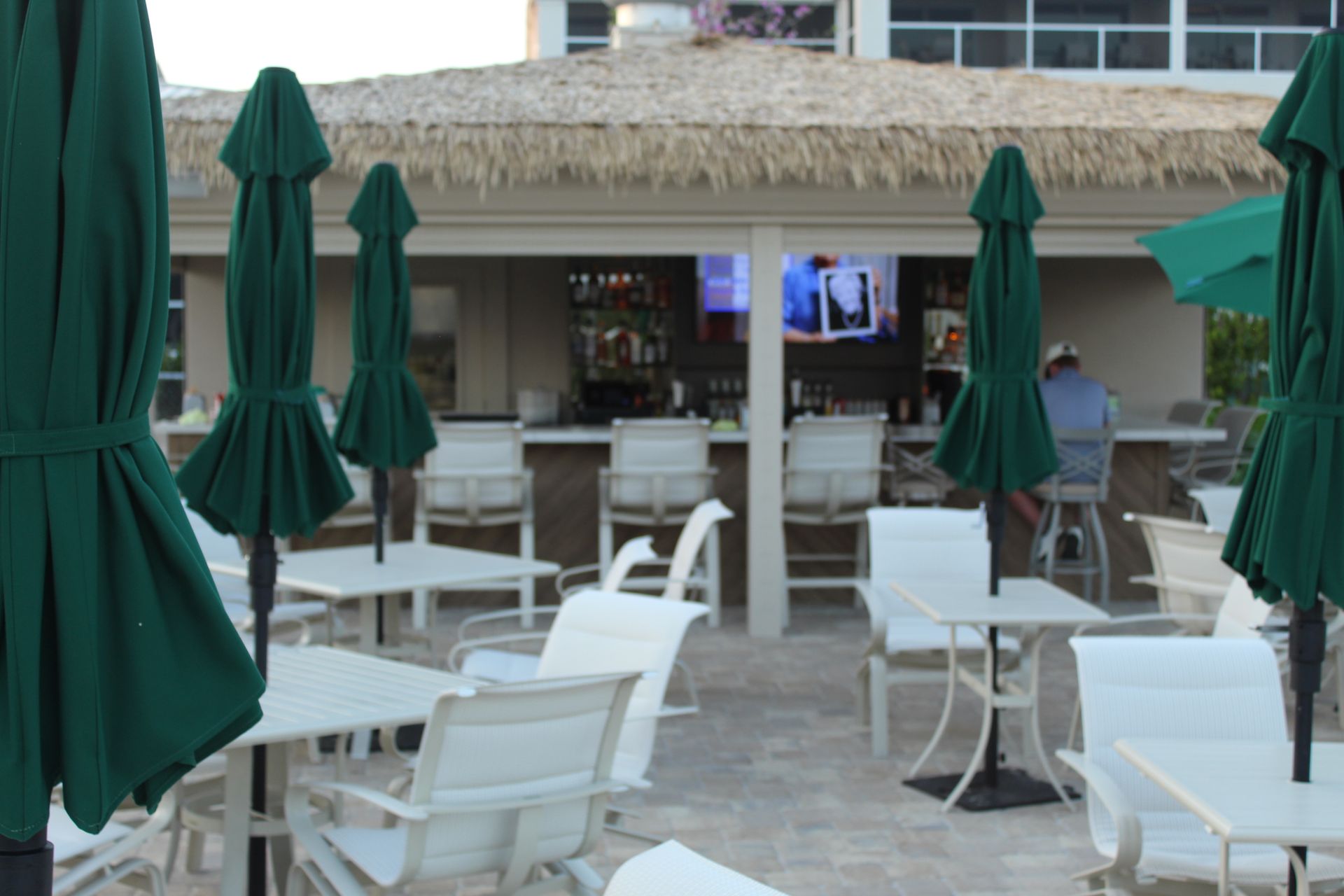 Outdoor seating with tables and umbrellas 
