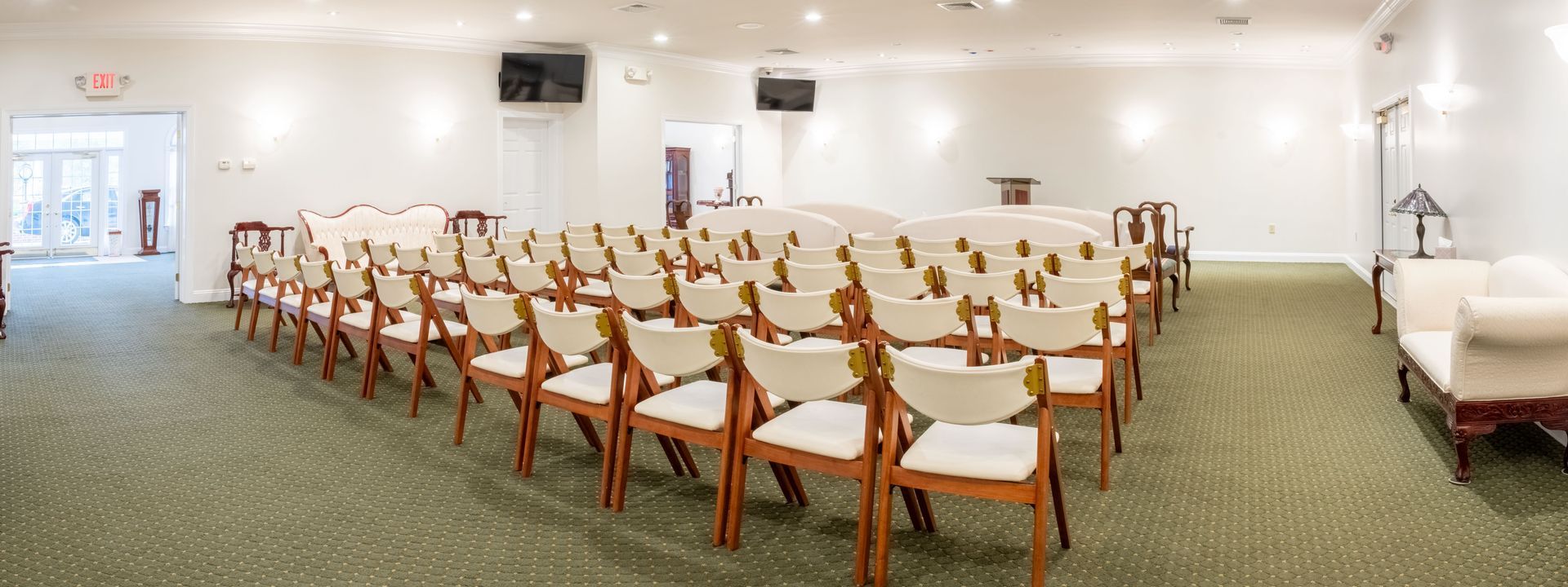 Goldsteins' Rosenberg's Galloway funeral home main chapel seating area view from back to front