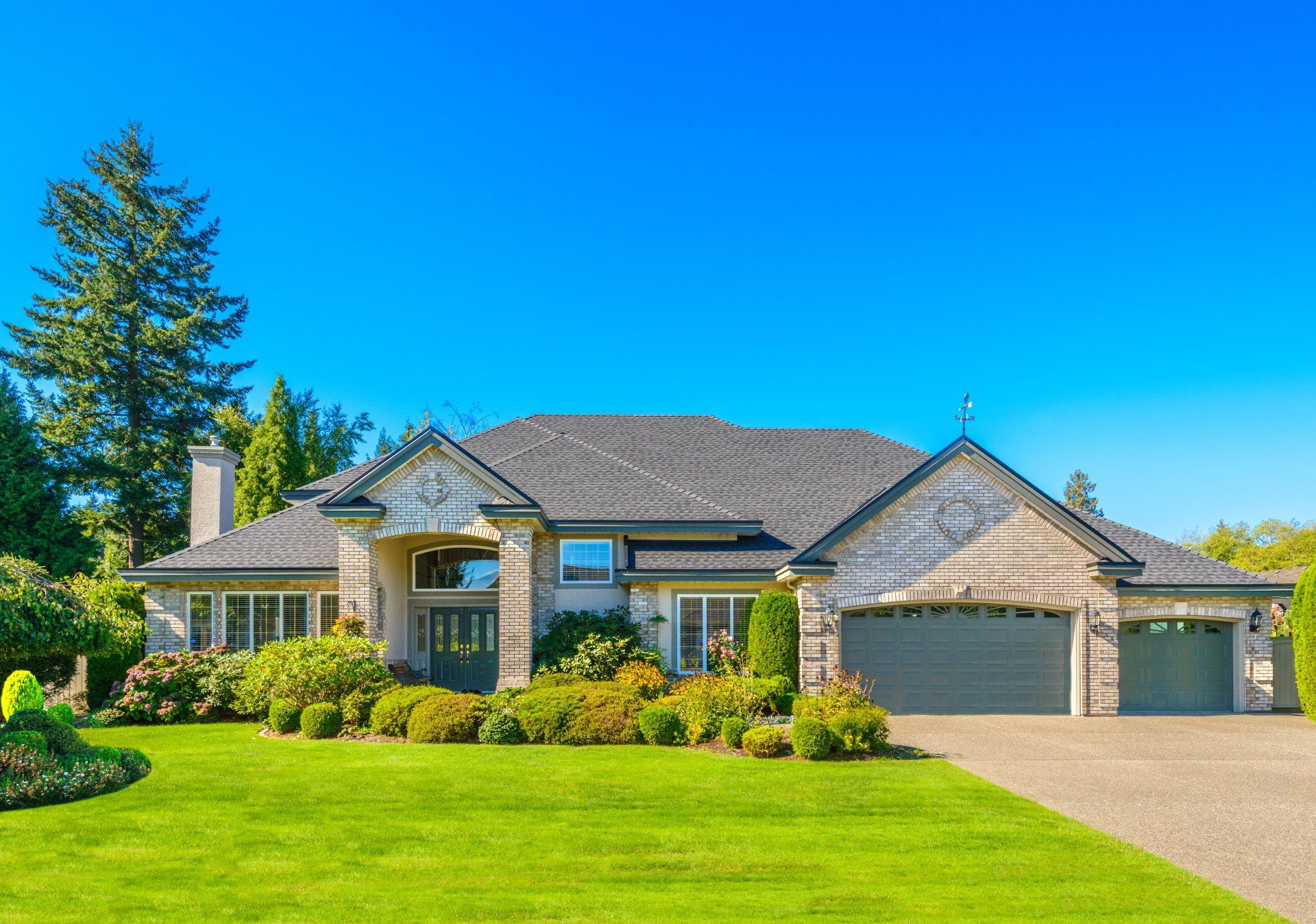 a beautiful home with a healthy yard