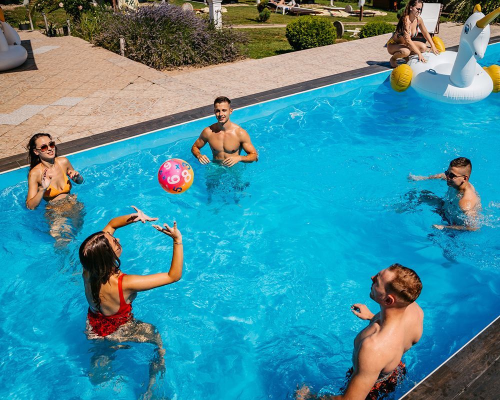 Chairs Next to a Large Swimming Pool – Inman, SC – Five Star Pool Service