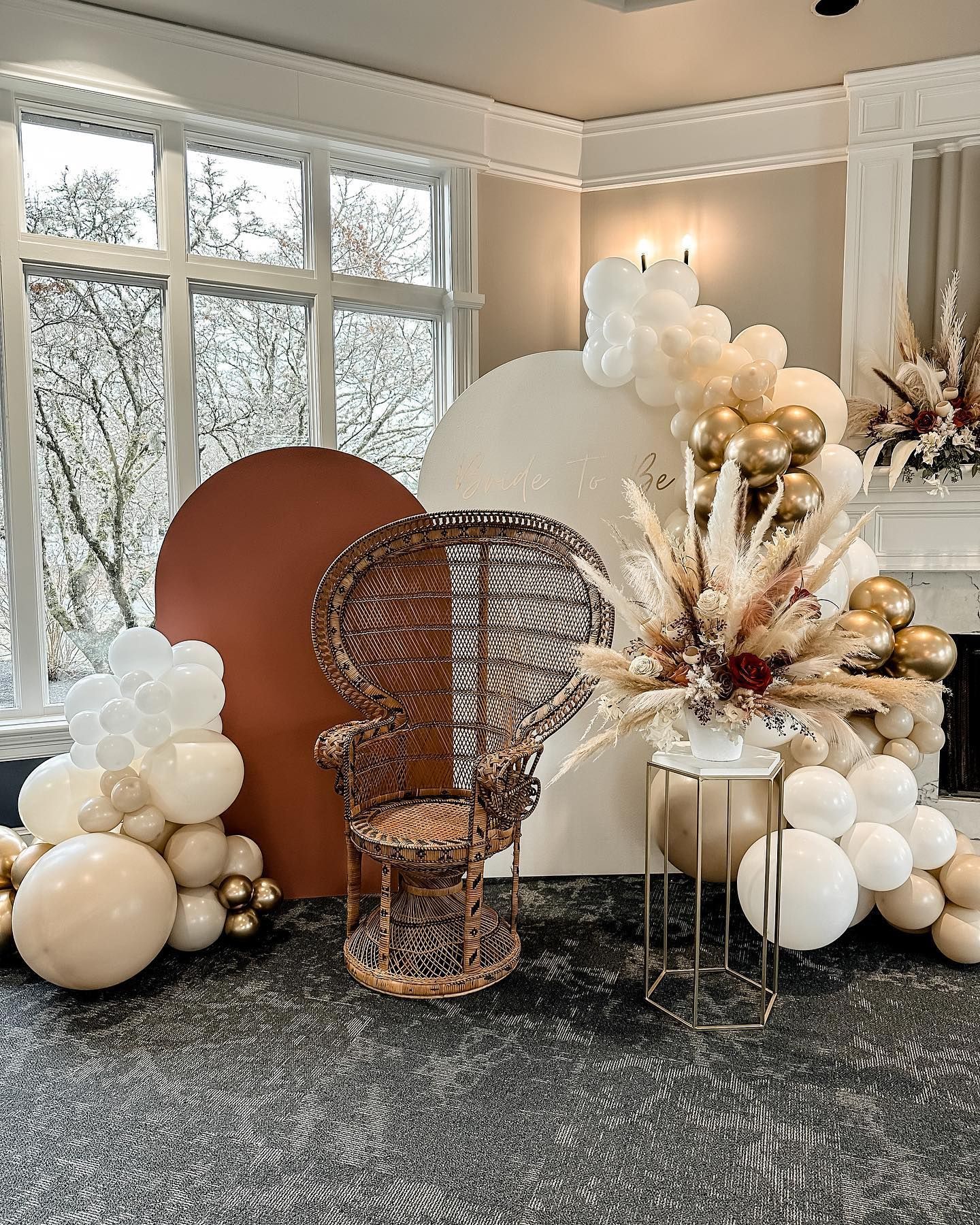 A room filled with balloons and a chair.