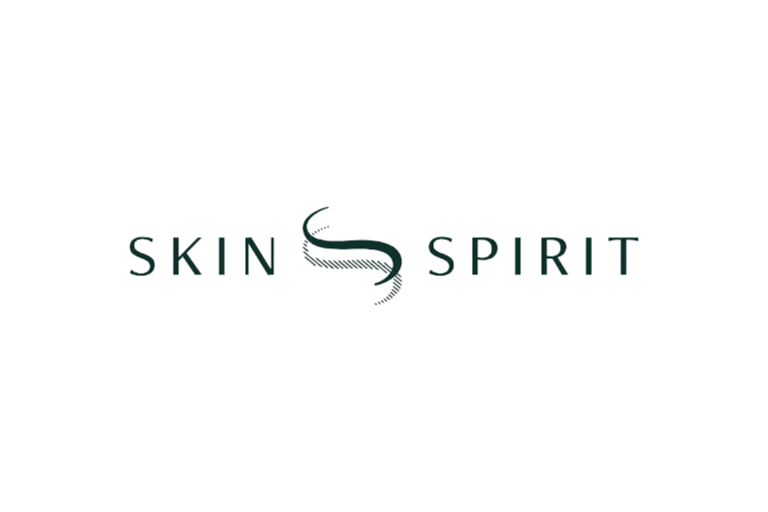A logo for skin spirit with a snake on it.