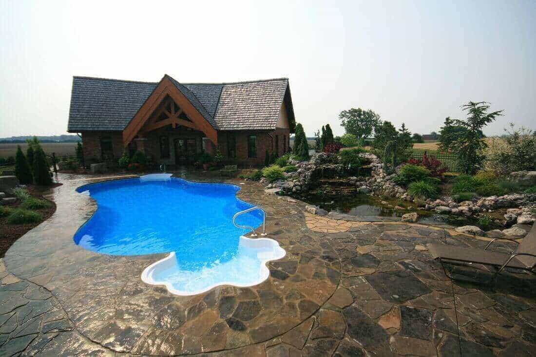 Pool Area With Step In Spa — Shippensburg, PA — Cumberland Valley Pools LLC