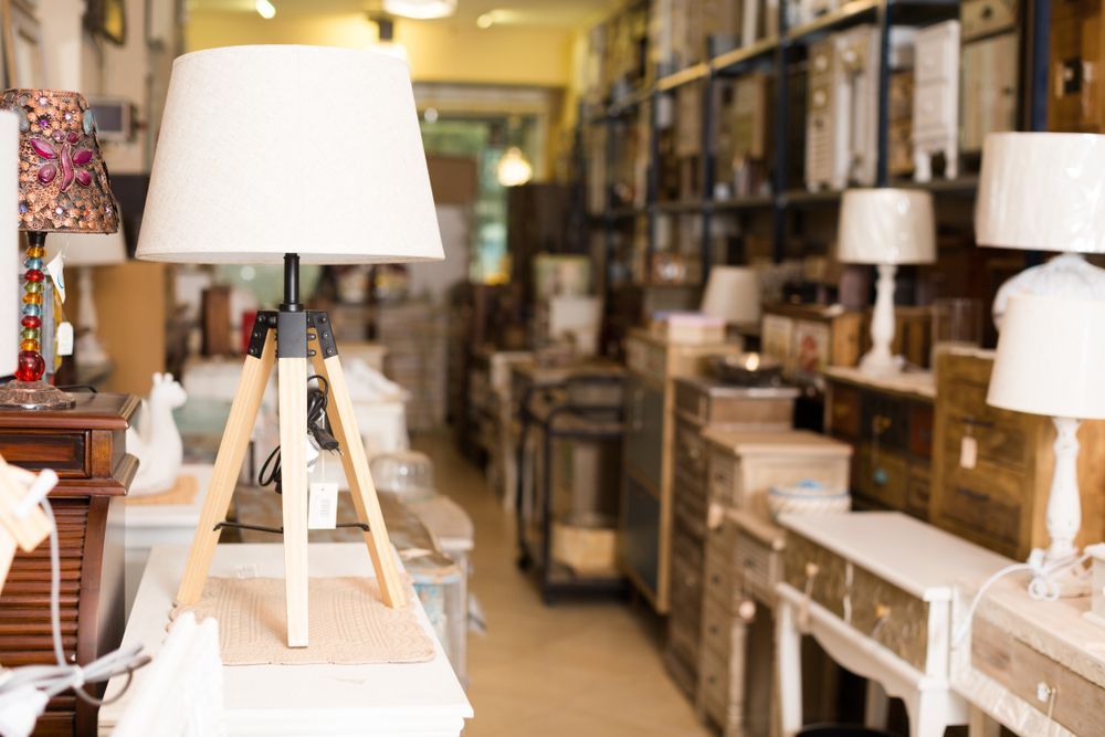 A Lamp Is Sitting On A Table In A Store — InHouse Homewares in Forster, NSW