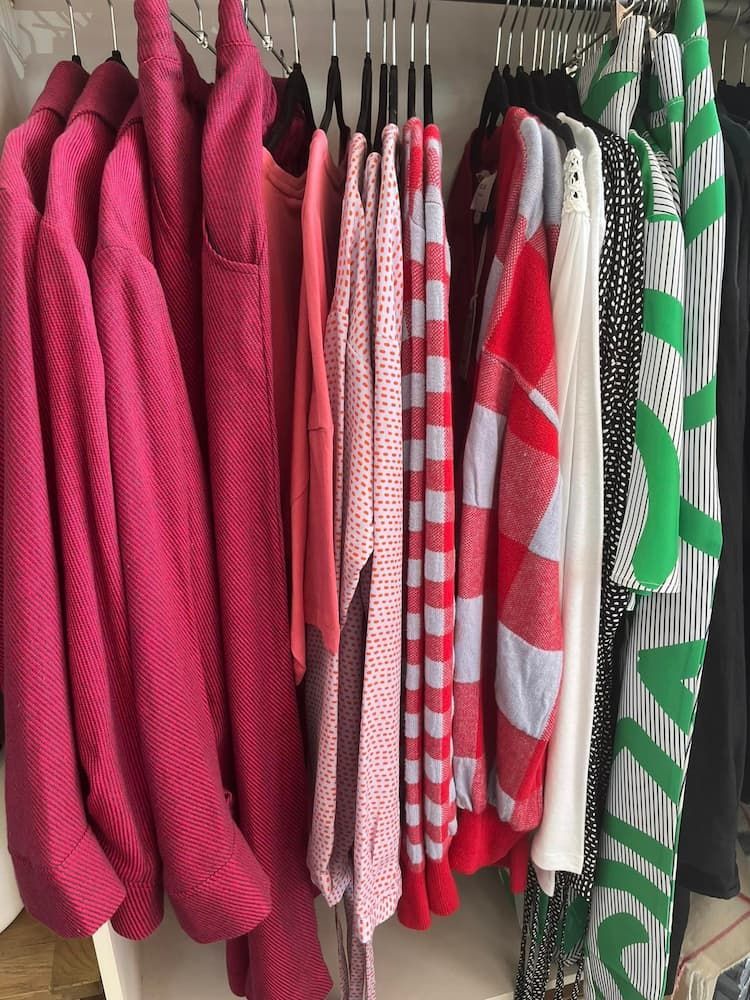 A bunch of clothes are hanging on a rack — InHouse Homewares in Forster, NSW