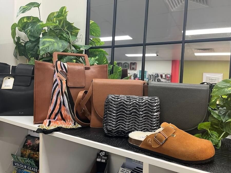 A Wooden Table Topped With A Hat — InHouse Homewares in Forster, NSW