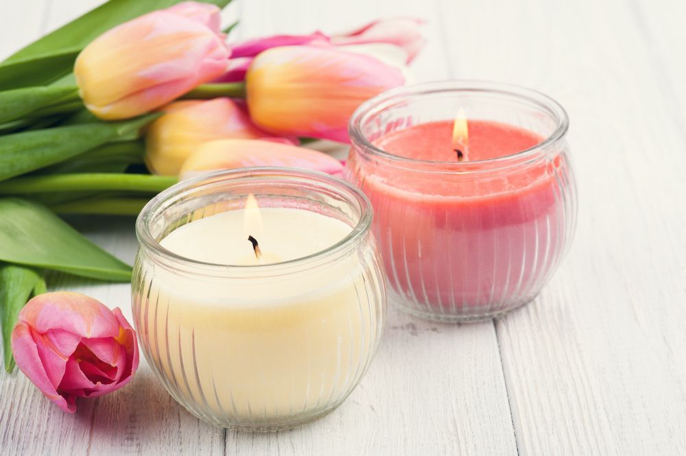 Two Candles And A Bouquet Of Pink Tulips On A Wooden Table — InHouse Homewares in Forster, NSW