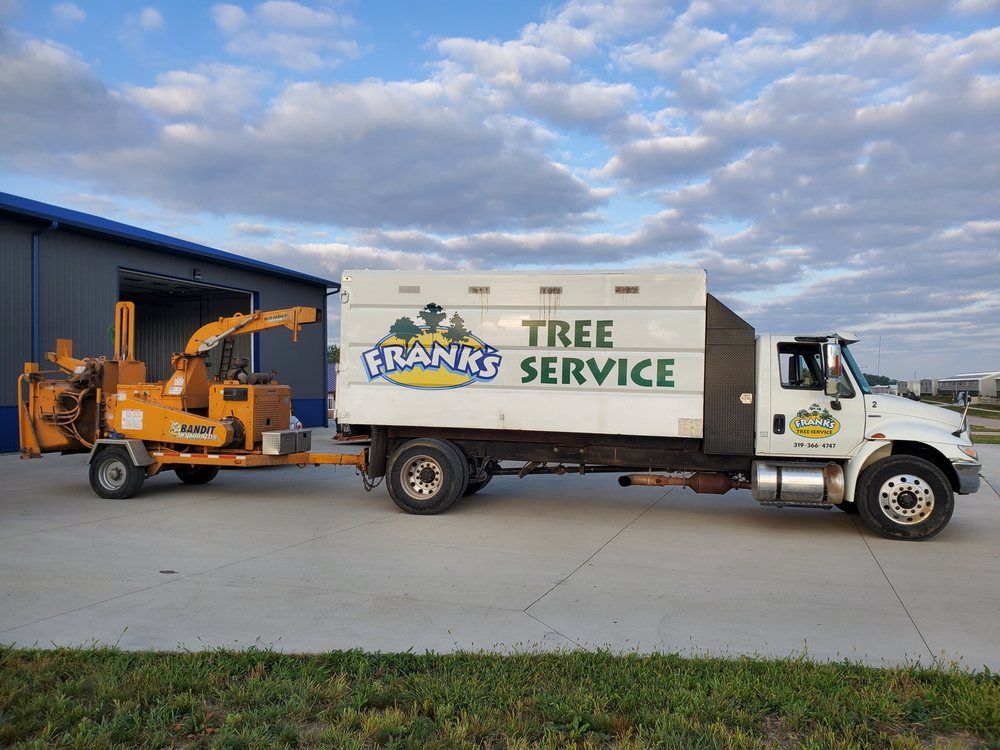 White Color Vehicle — Marion, IA — Frank’s Tree Service