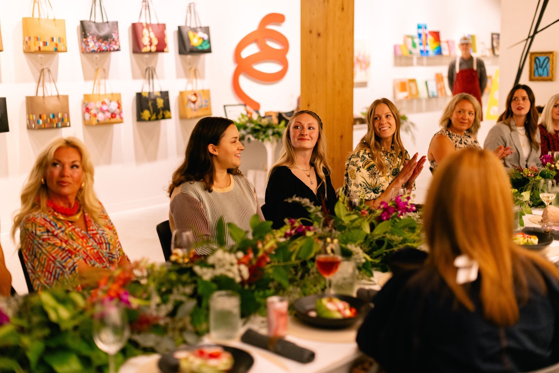 Local creative women savoring the beautiful display, great food, drinks, and wonderful company