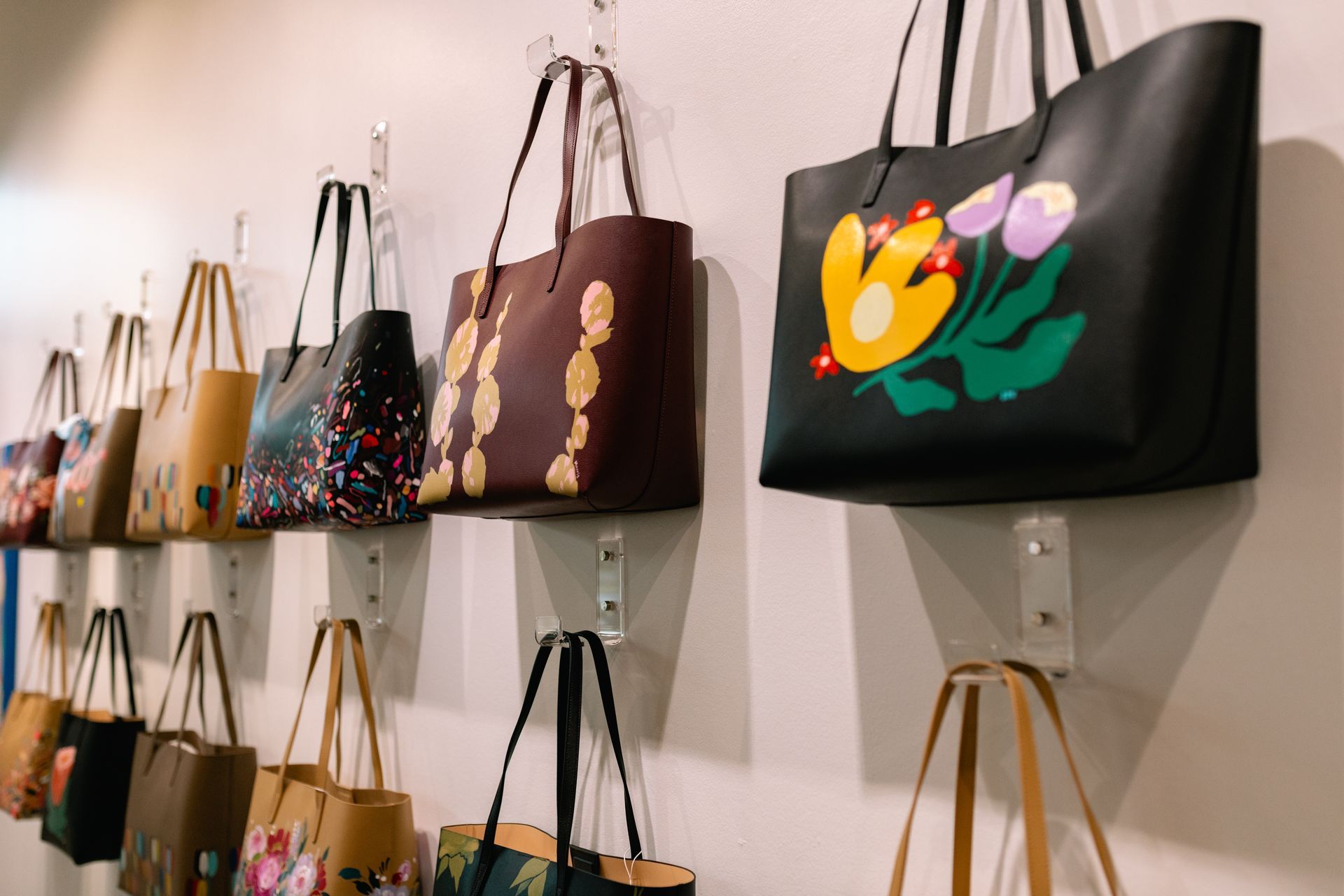 The one-of-a-kind, hand-painted Leather bags