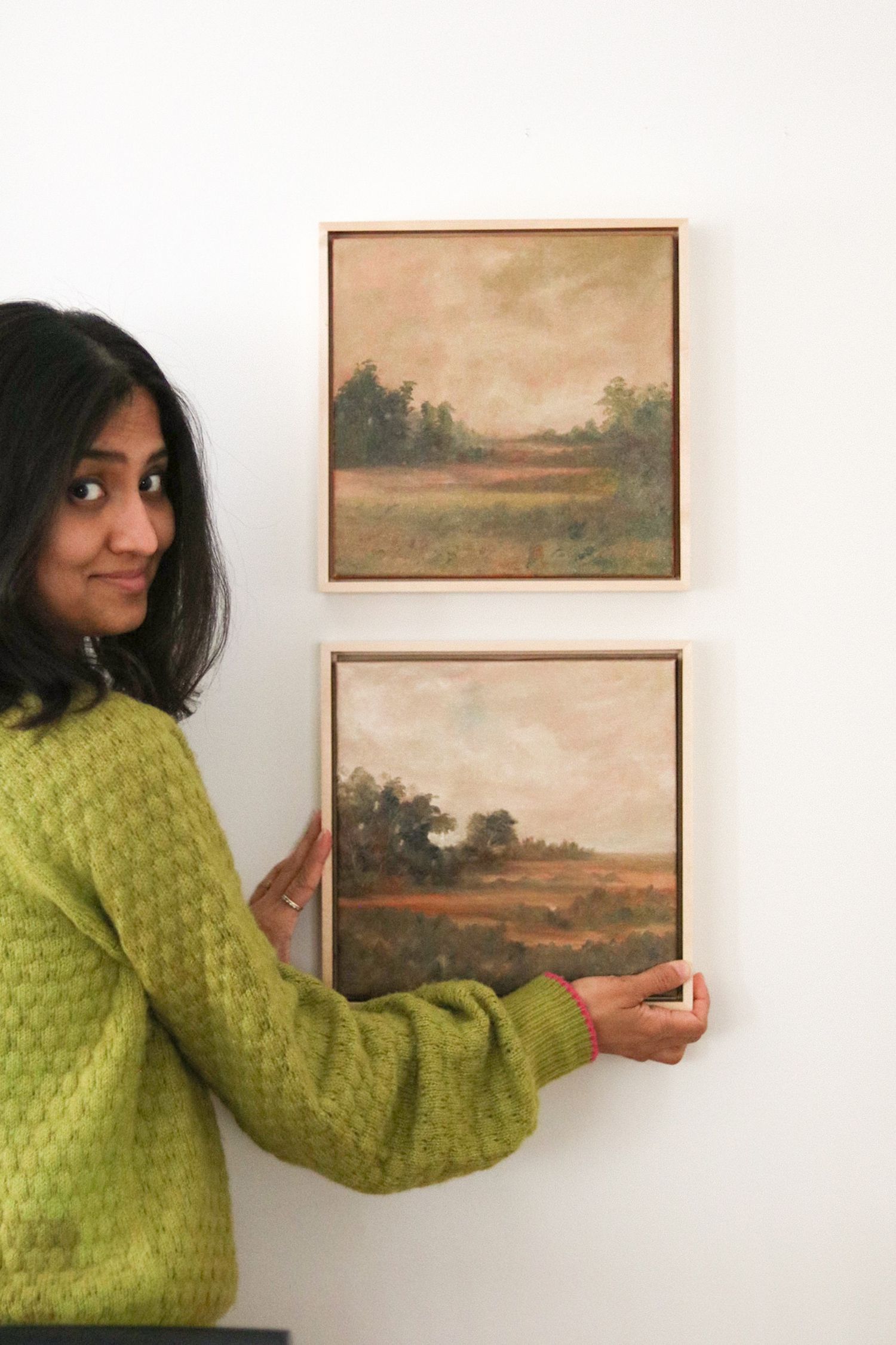 Anee Shah holding painting