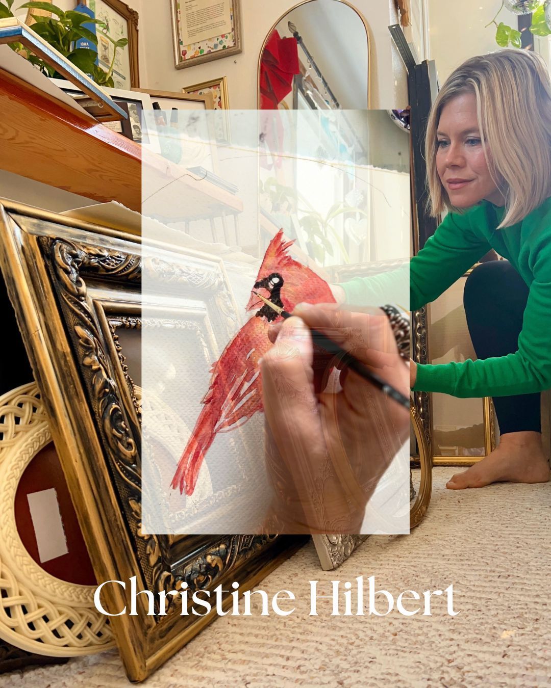 Christine Hilbert looking through vintage frames... transparent image of Christine painting a cardinal over the vintage frame imagery