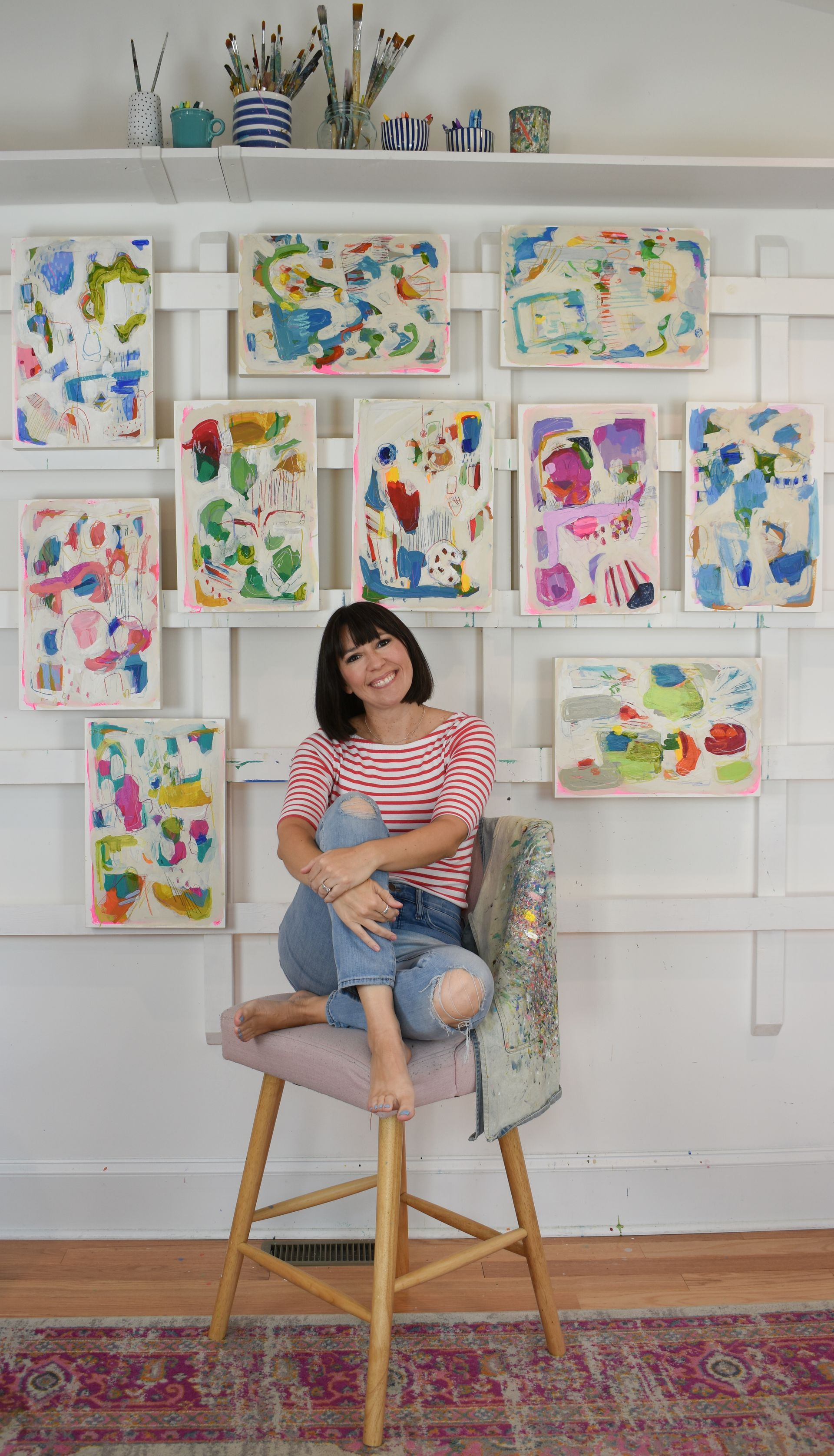 Daisy Faith posed with her artwork