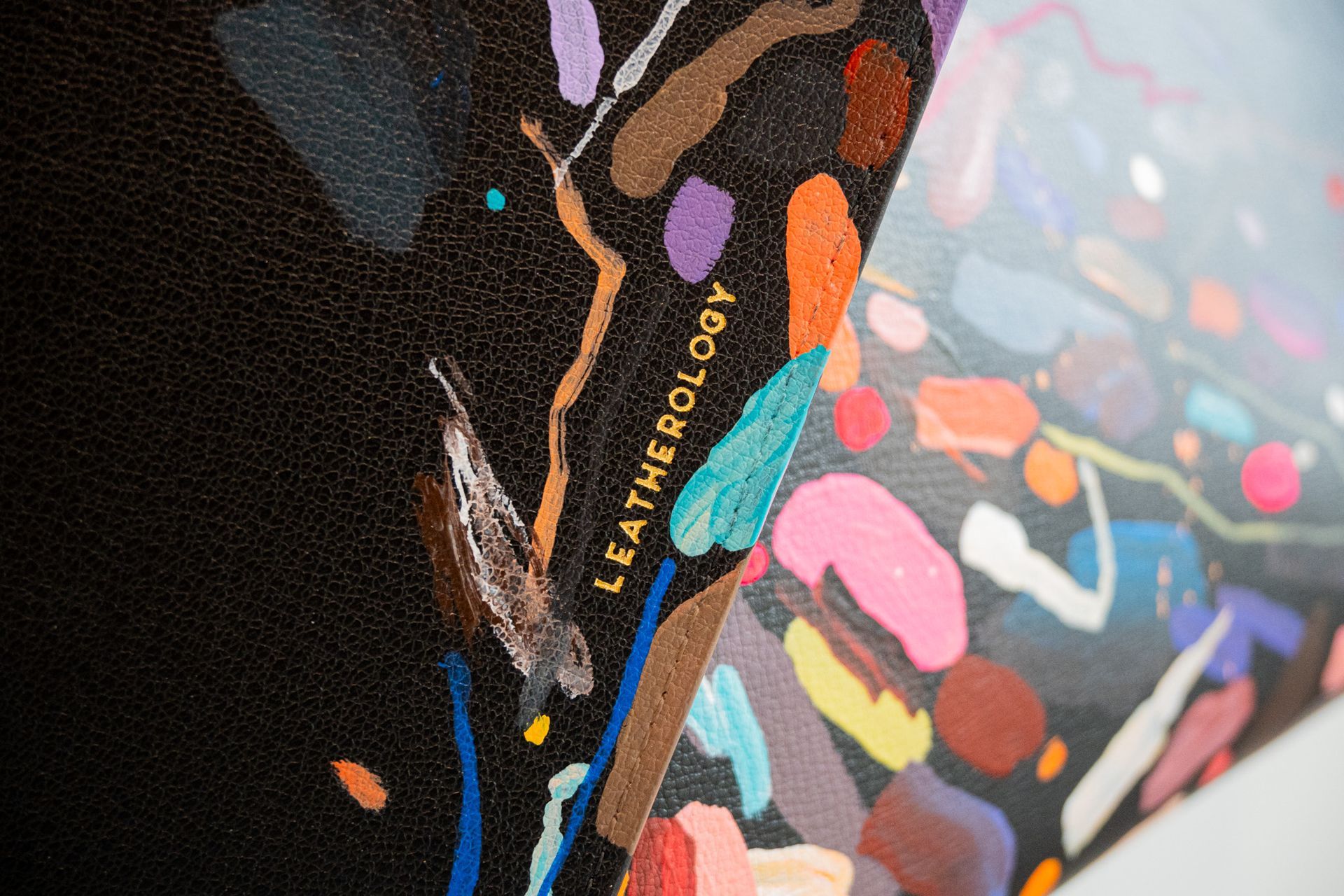 Hand-painted Leatherology tote bag by Sarah Schwartz