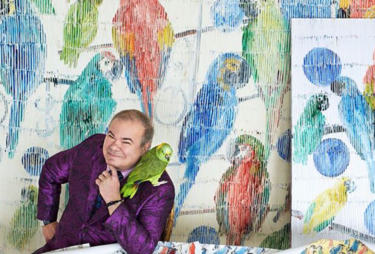 Hunt Slonem with Assorted Bird paintings and one of his many bird companions