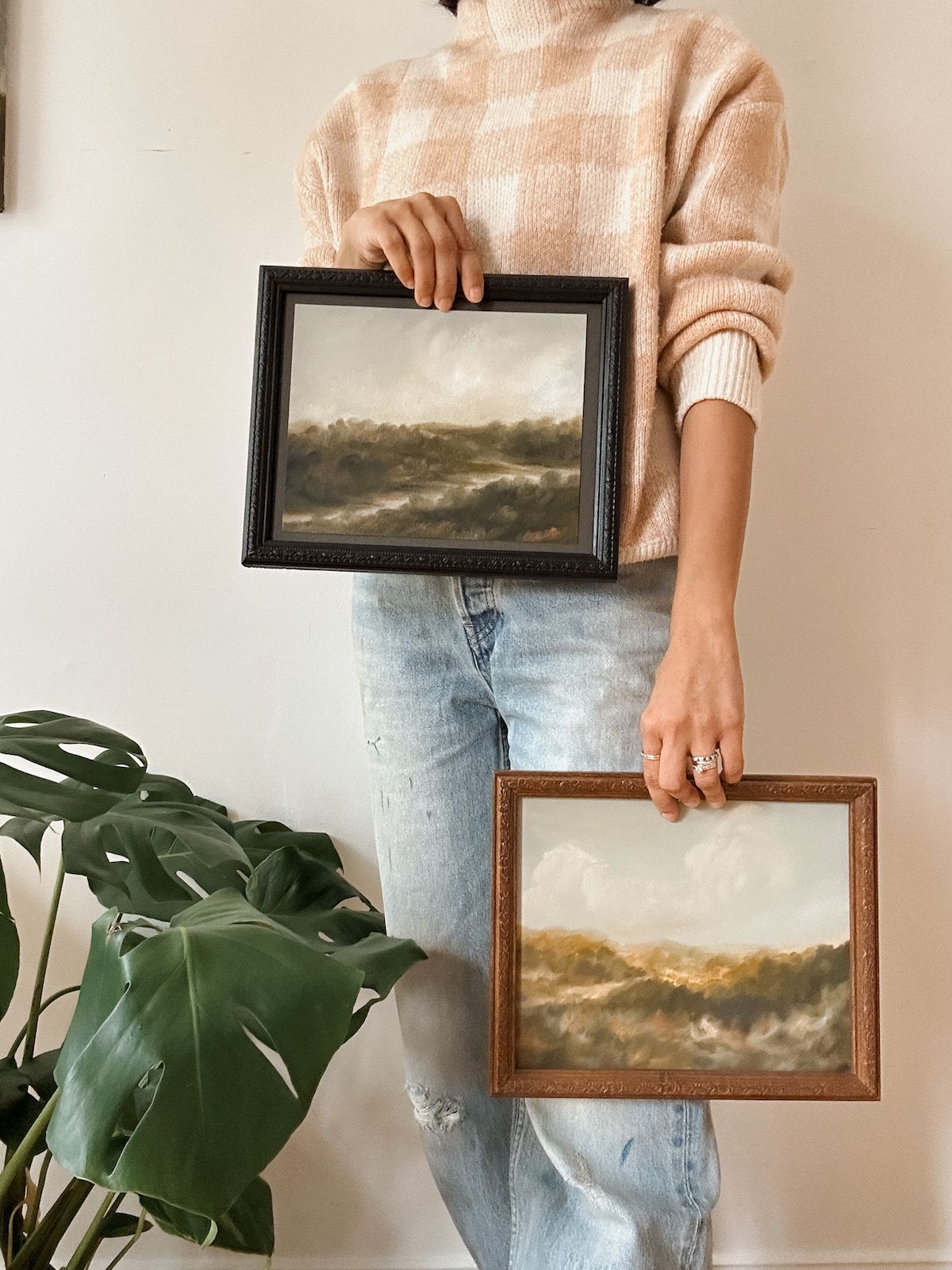 Anee Shah holding painting