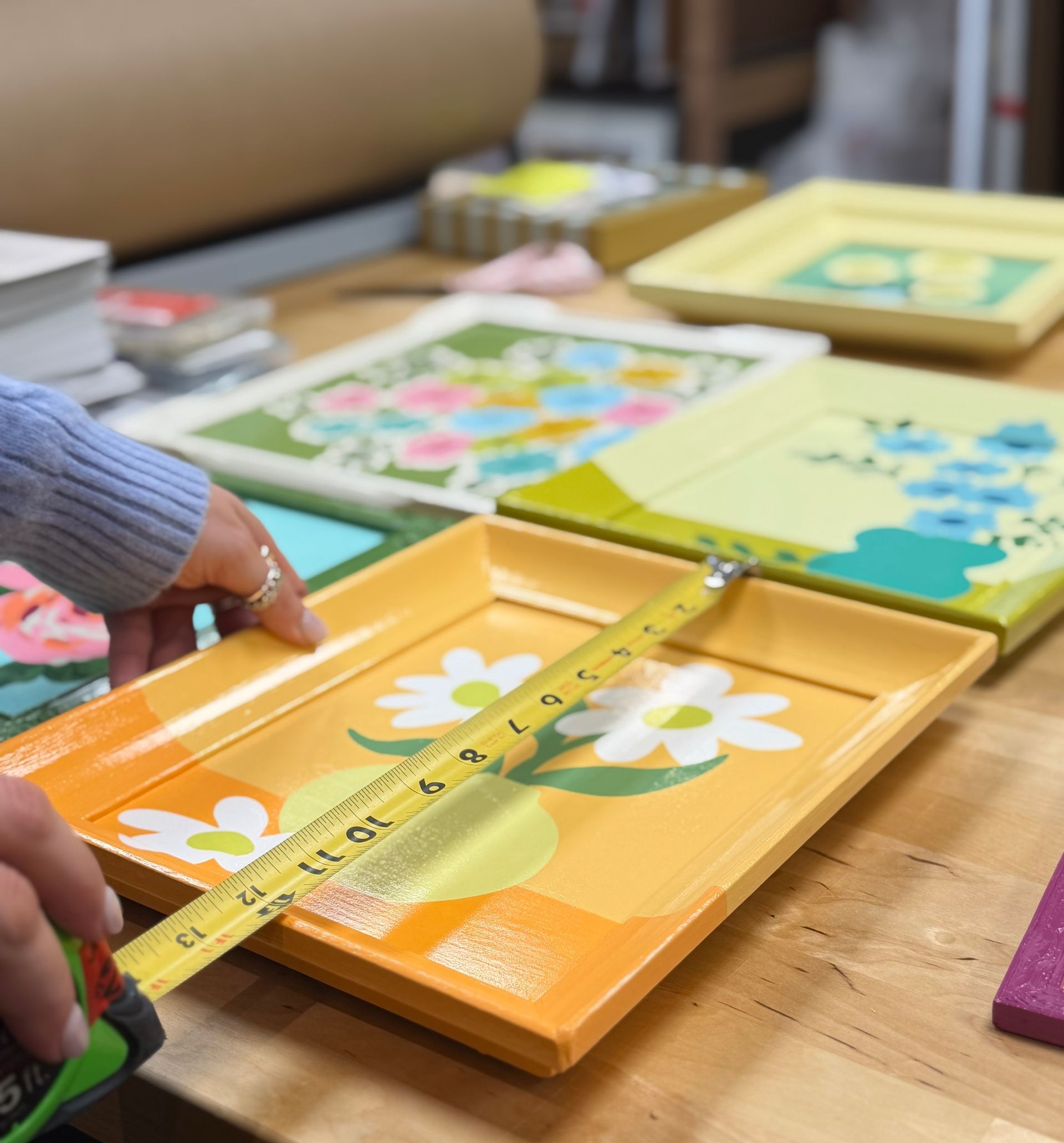 Lily measuring artwork