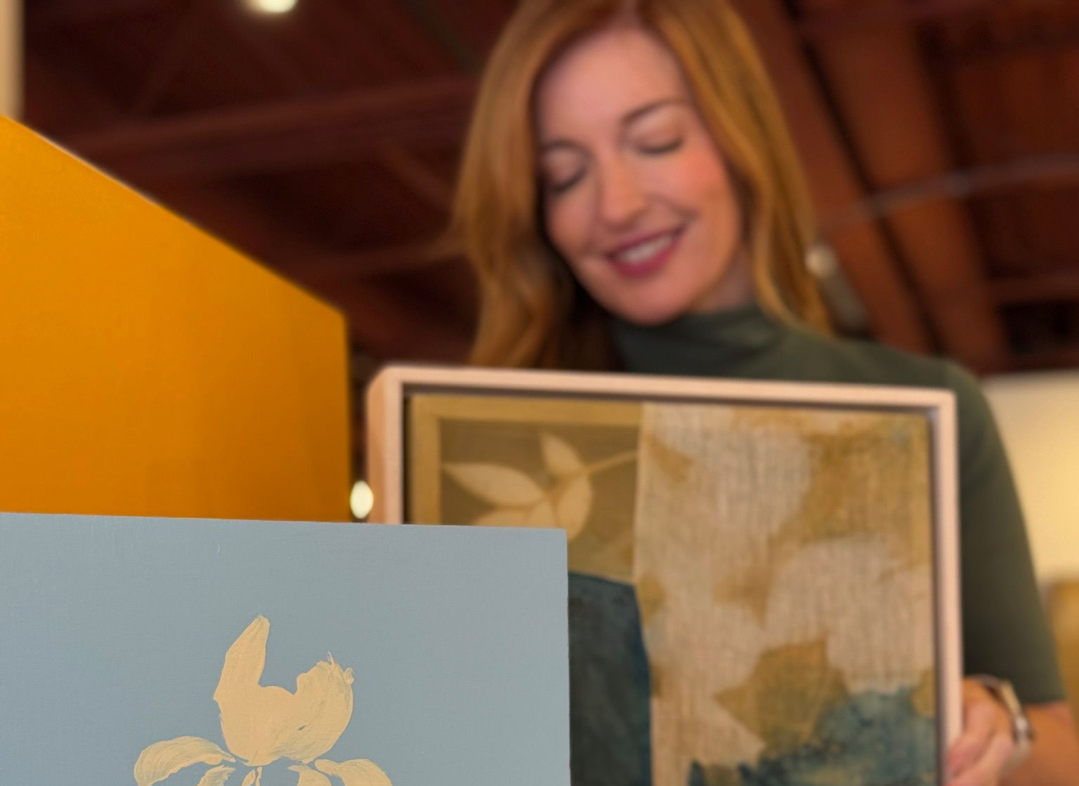 Liz with two pieces of art