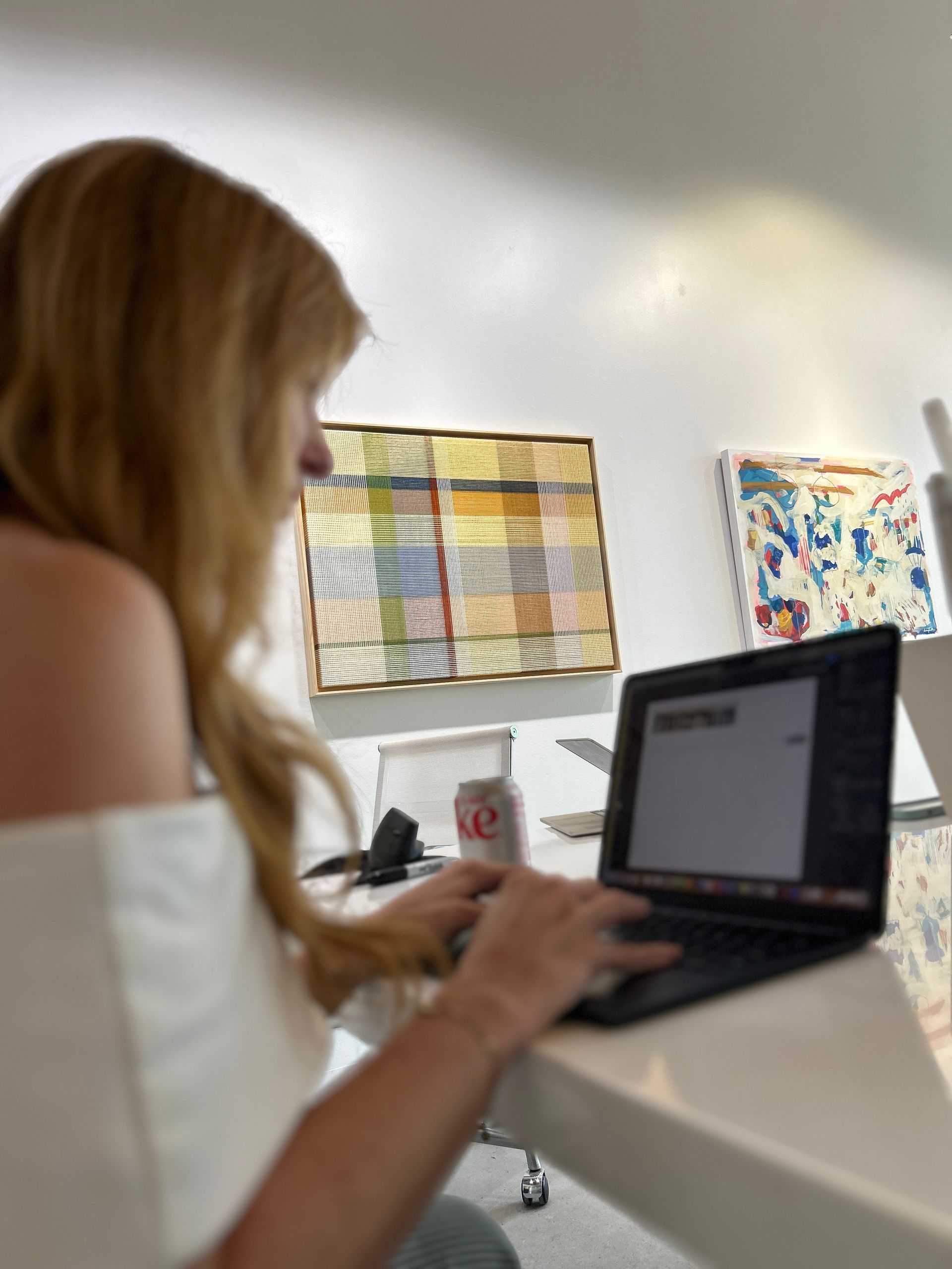 Liz working at the gallery