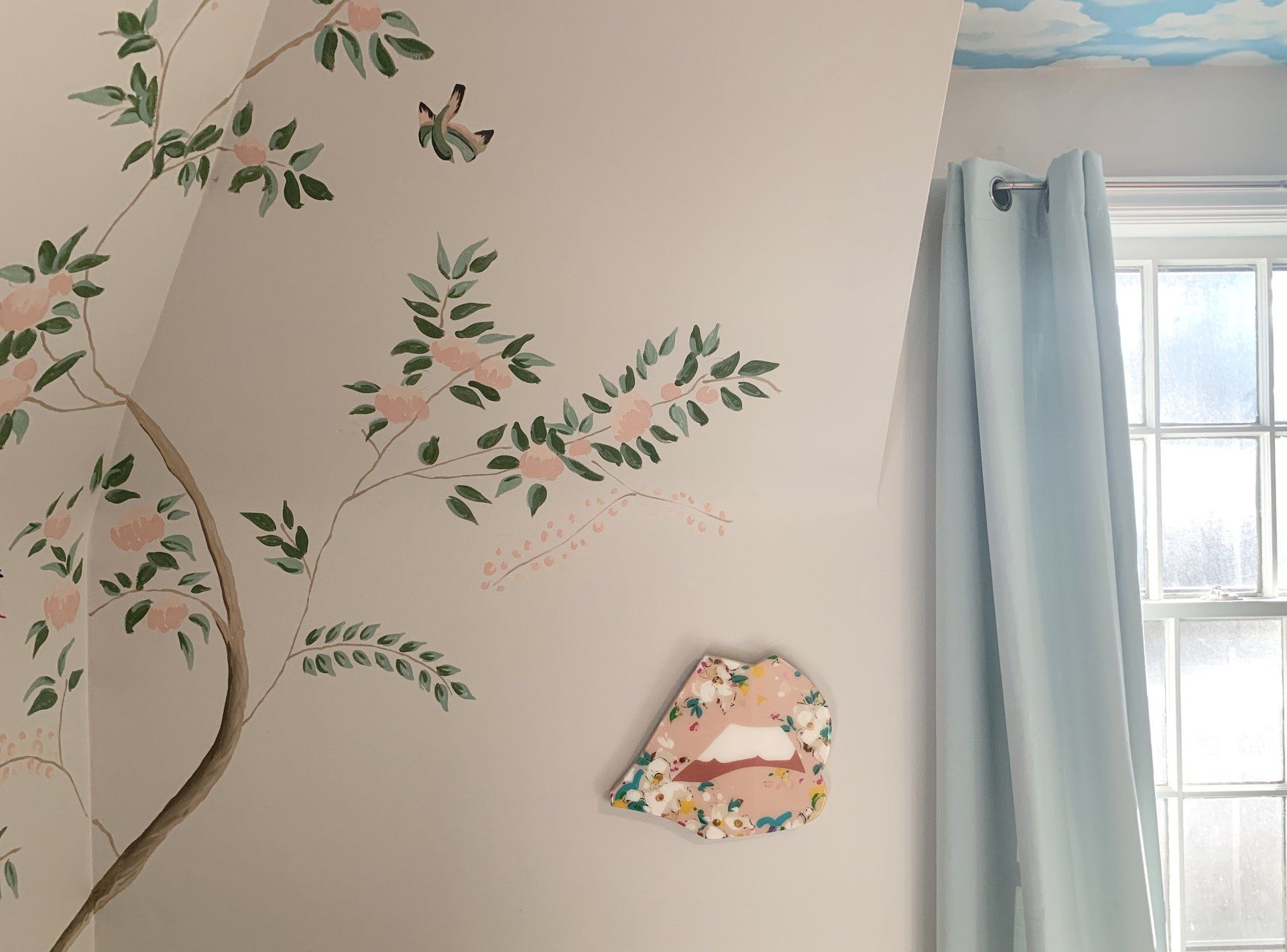 The other corner of Effie's room featuring mural elements and Angela Chrusciaki Blehm's lips