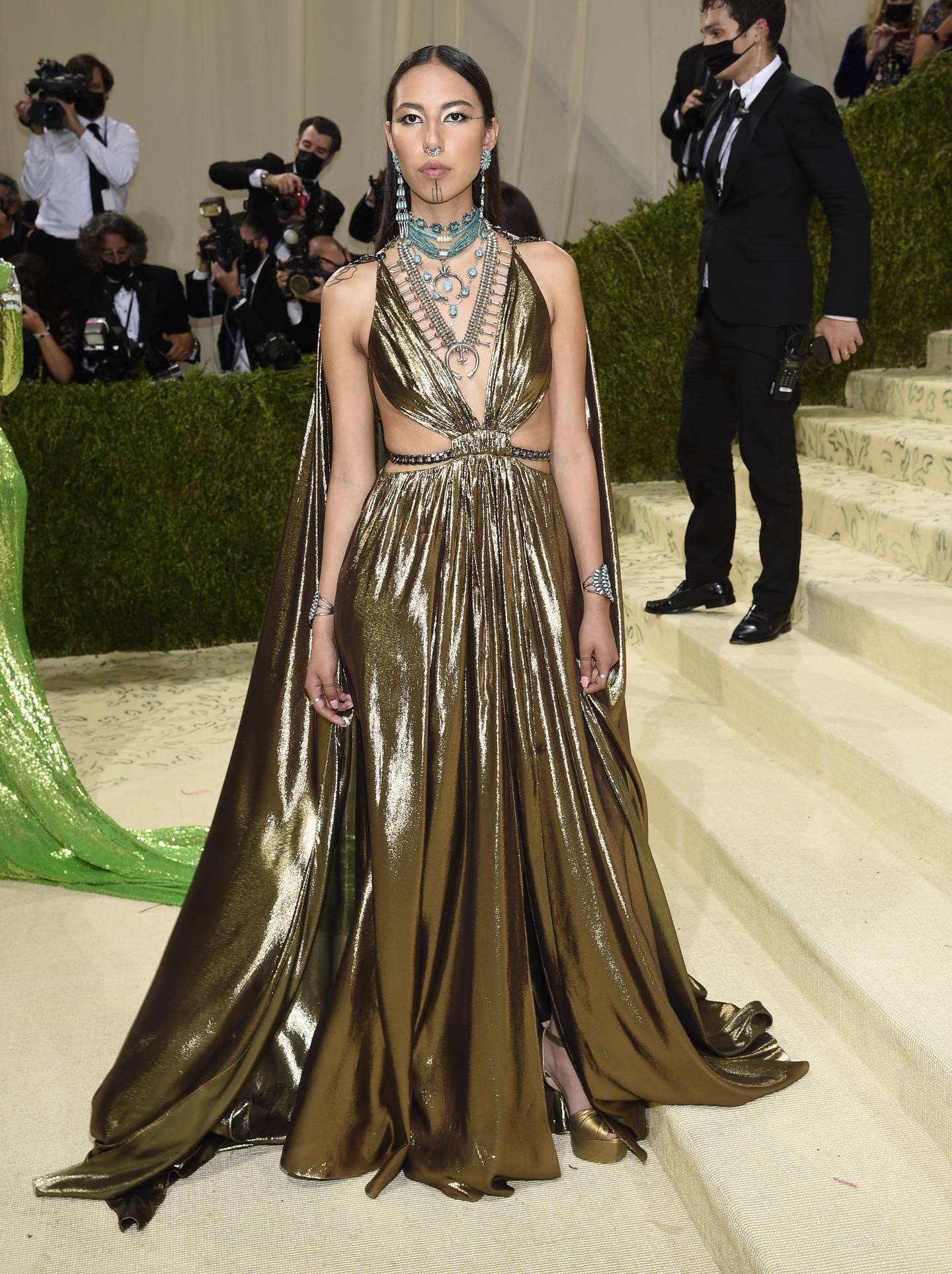 Quannah Chasinghorse at the Met Gala 2021 in gold 