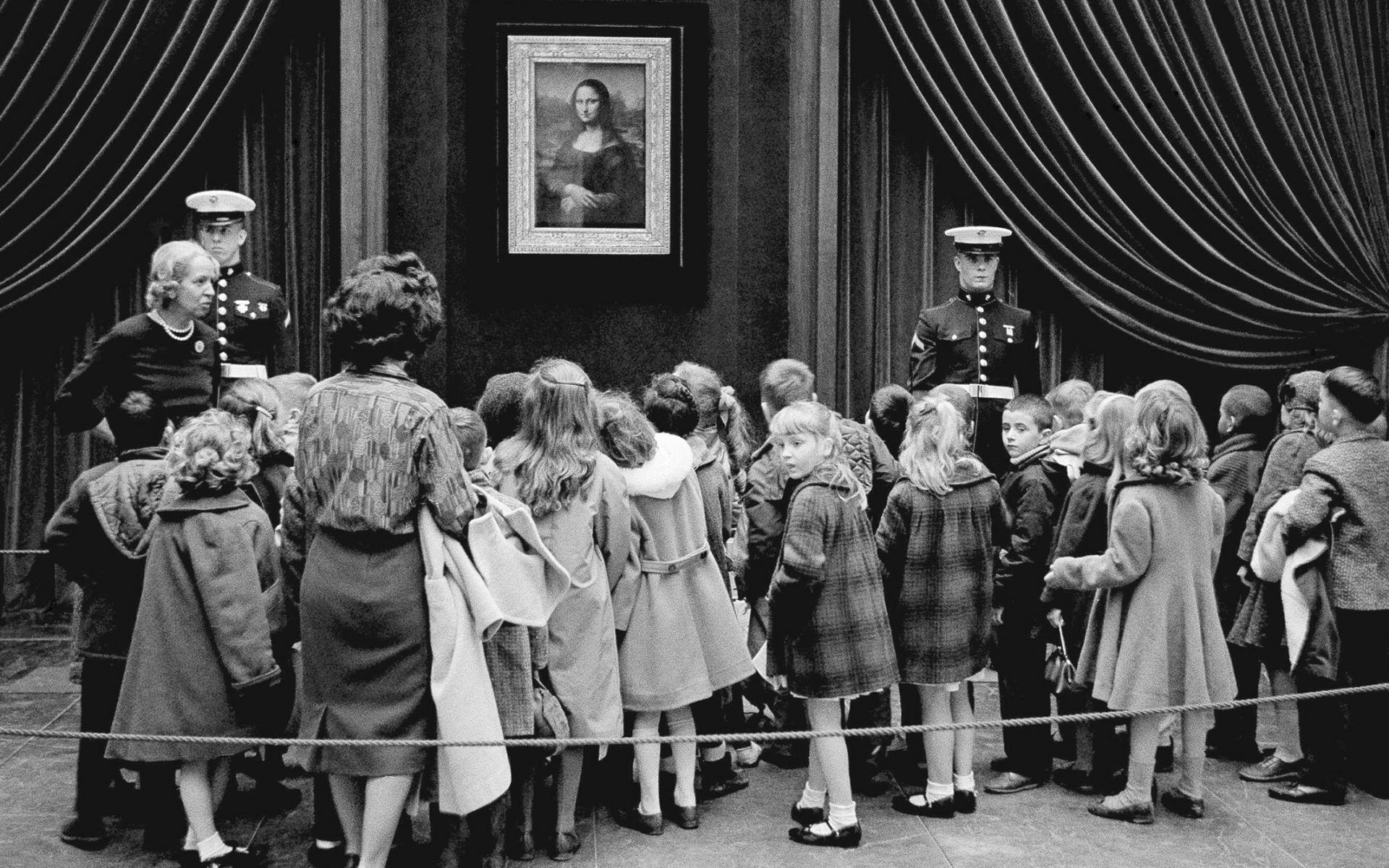  Young visitors crowd around the Mona Lisa during its visit to the National Gallery of Art in Washington.   Photo: AP Images.