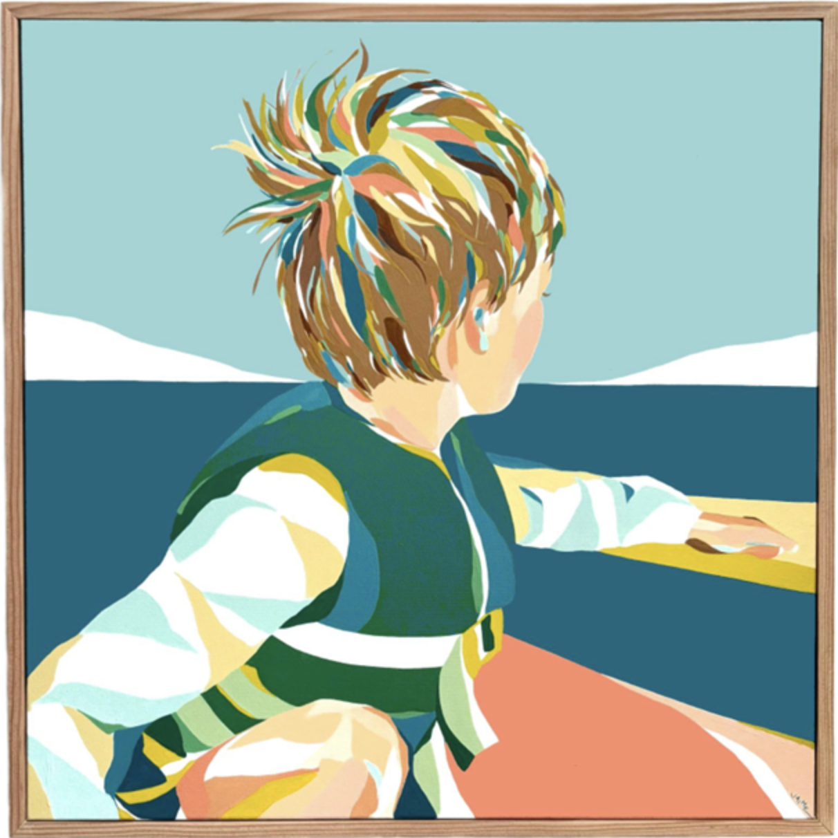 Boy looking out at sea wearing life jacket and long sleeve 