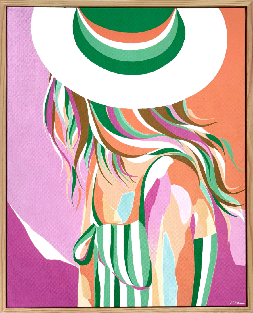 Woman with large sun hat and striped swimsuit facing opposite direction with loose curly hair