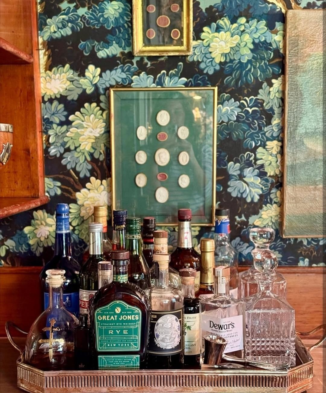 bar cart decorated with thrifted finds