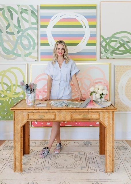 Hillary Howorth in her studio with artwork