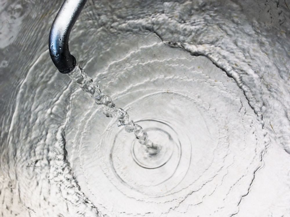 A Close Up of a Sink With Water Running From a Faucet — Sue's Clear Water in Koumala, QLD 