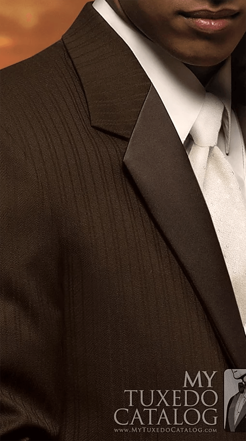 A man is wearing a brown tuxedo with a white shirt and tie