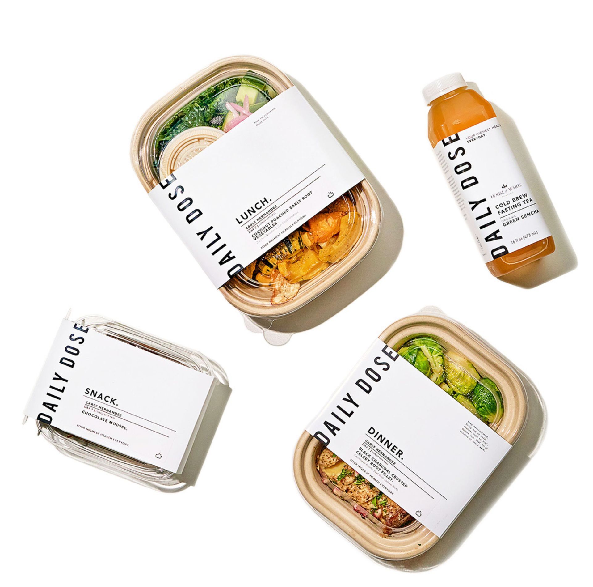 Daily Dose 5-Day ReBOOT meal kit featuring organic lunch, dinner, snack, and cold brew fasting tea. A real food detox program designed to restore energy, gut health, and overall wellness.