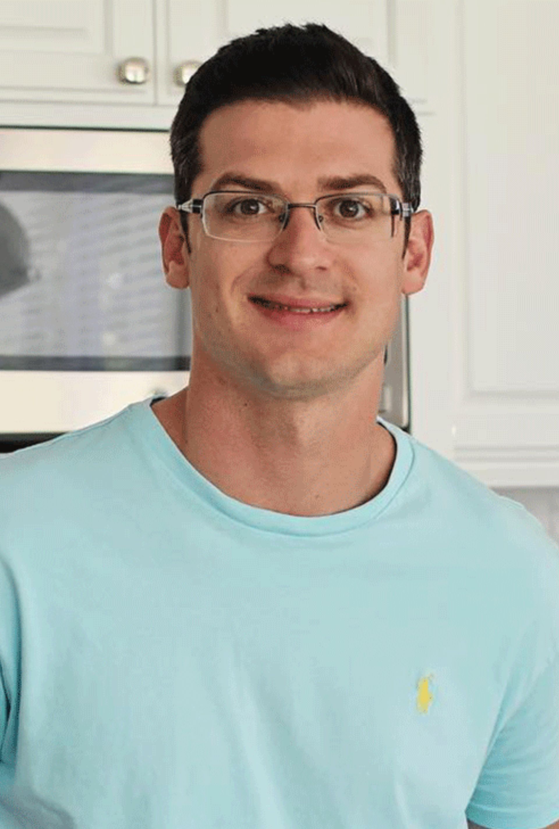 Dr. James DiNicolantonio, cardiovascular research scientist and author, wearing a light blue polo shirt in a kitchen setting. A leading expert in nutrition and metabolic health, he collaborates with Daily Dose on Meals by Dr. James DiNicolantonio, designed for optimal health, performance, and longevity.